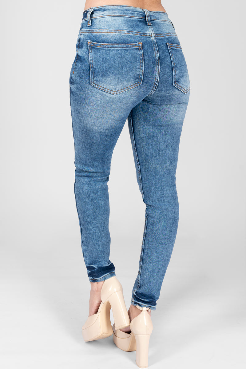 Jeans skinny tiro medio con bolsas (7004355362858)