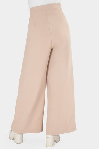 Pantalón ancho con pinzas y bolsillos