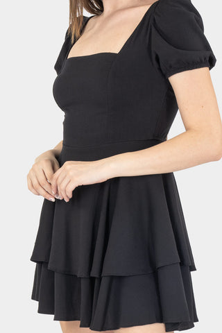 Vestido corto con olanes
