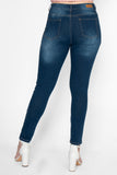 Jeans skinnr de tiro alto