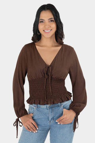 Blusa de manga larga con amarre