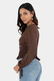 Blusa de manga larga con amarre